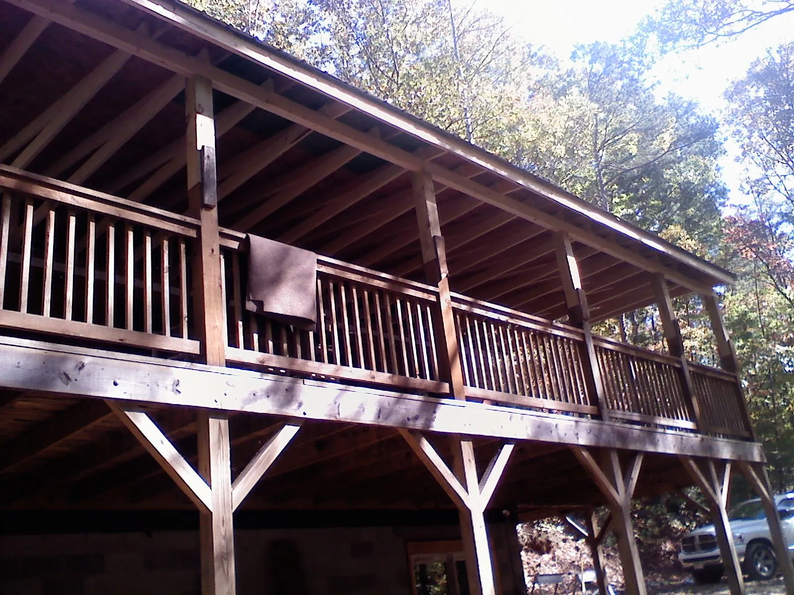 Timber framing under a new elevated porch and deck — Roof Leak Repair in Nowata by Roofing Brothers